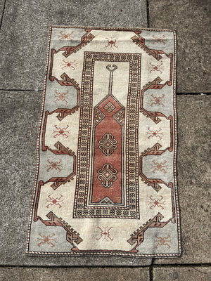 Rug 2'6”x4' 4” Tan, Light Blue, Brown, and Rust Red