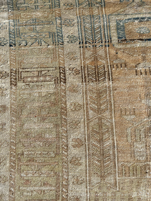 Rug 4'2"x6'9" Tan, Blue, Brown, and Green